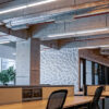 Empty office space with suspended LED linear lighting