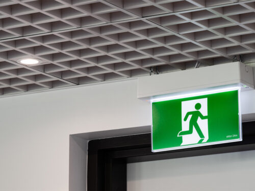 Ektor Emergency Exit sign above doorway