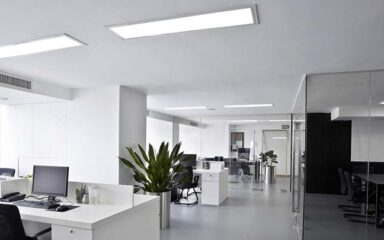 Commercial Office space with glass wall boardroom and LED troffer lights