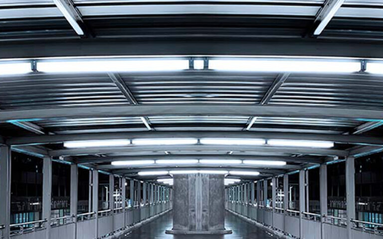 Umbra Core Batten Lights mounted on public walkway ceiling