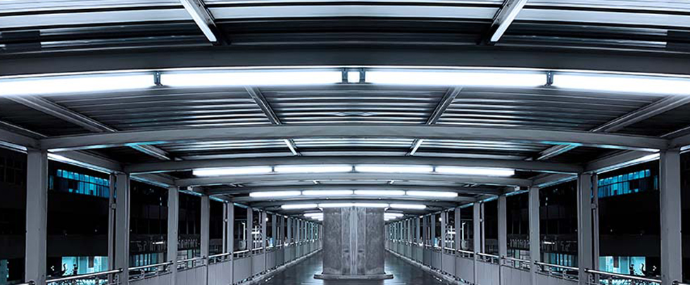 Umbra Core Batten Lights mounted on public walkway ceiling