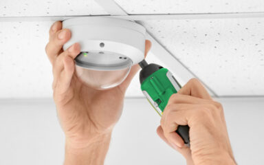 Ledfire Dome in ceiling being installed with screwdriver